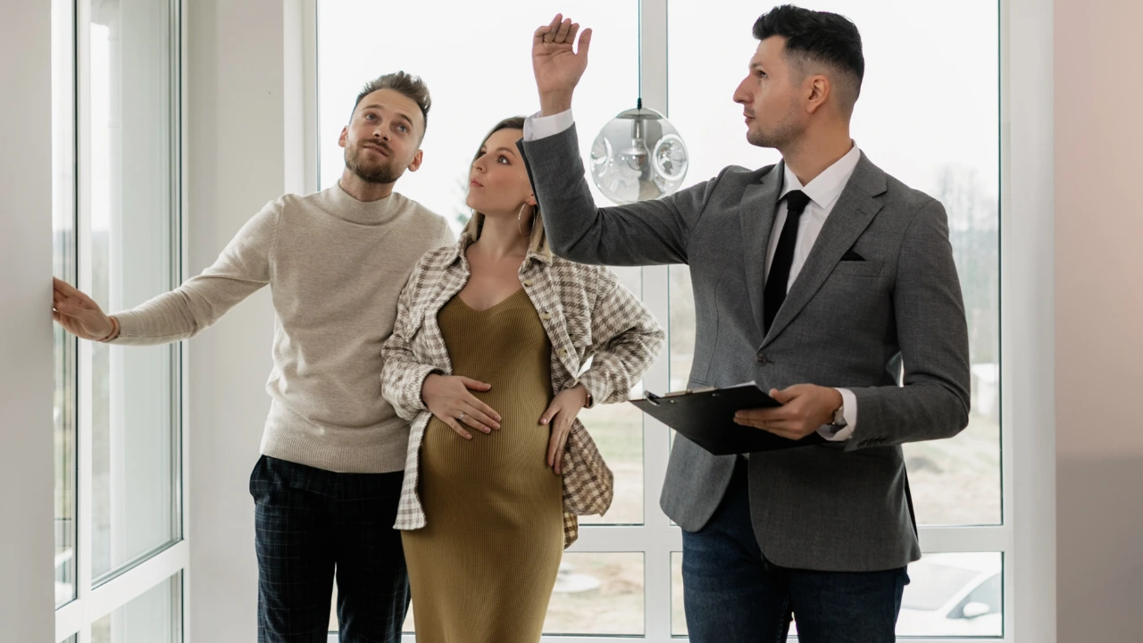How Property Management Helps Keep Condominiums Pest-Free Property management showing tenants the unit and building.