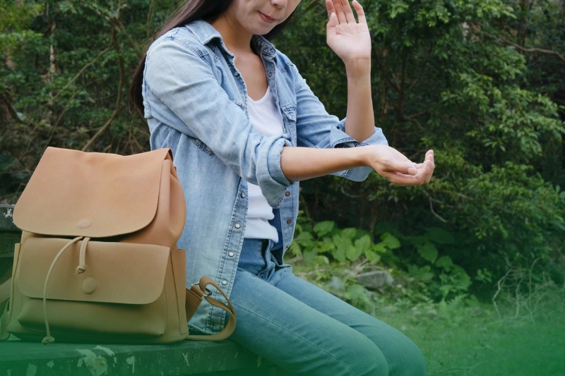 Mosquitoes are Attracted to Certain Factors woman feeling itchy of mosquito in the park
