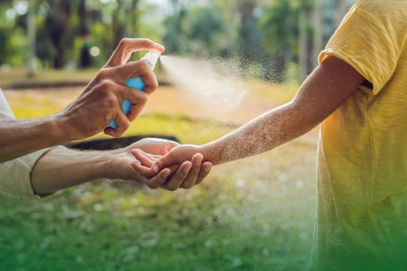 Use Mosquito Repellents mom and son use mosquito spray